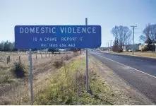 “Domestic violence is a crime， report it?！盋redit： Marc Anderson/Alamy Stock Photo